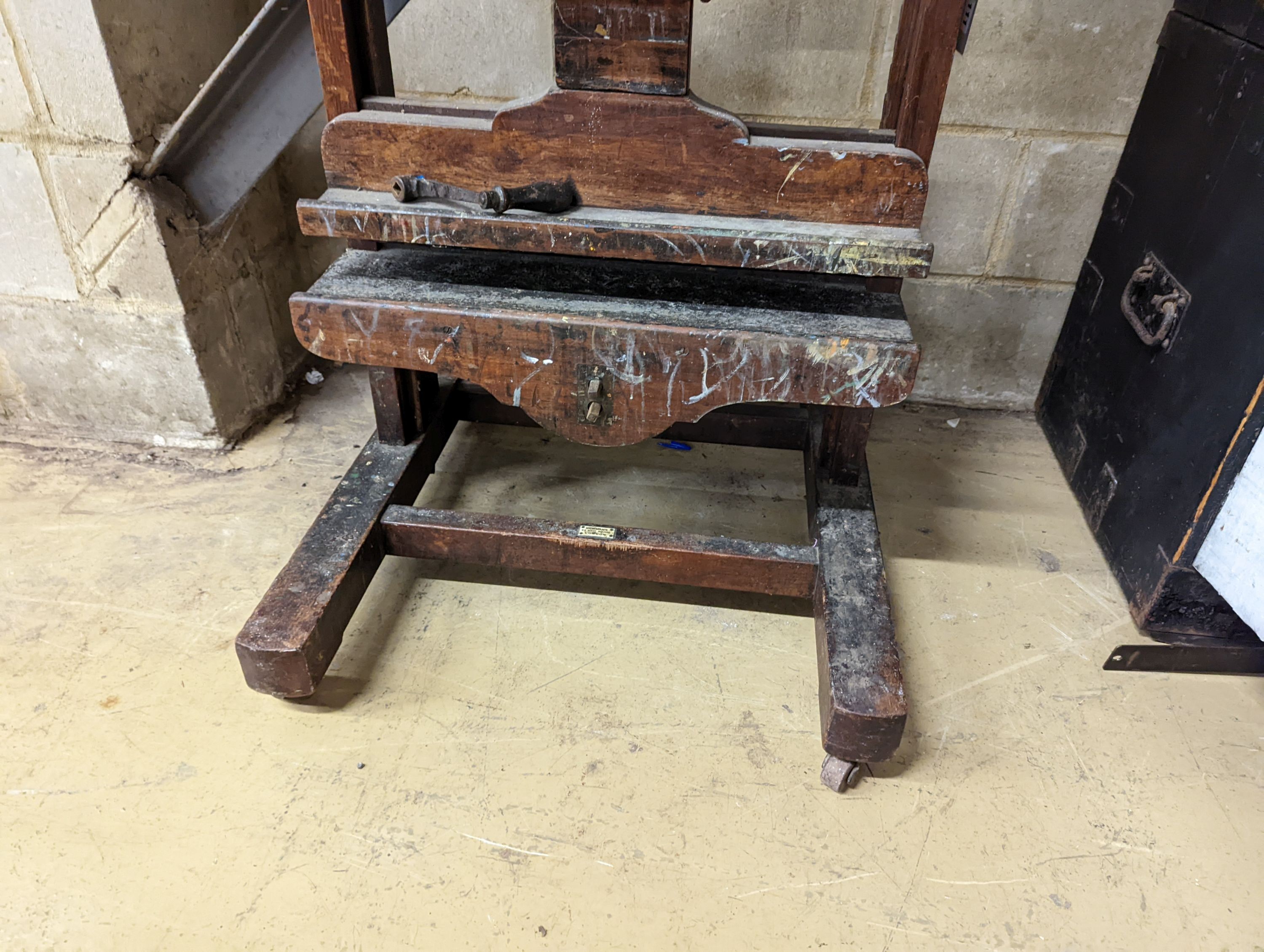 A large Newman’s of 24 Soho Square, London artists easel. Height (lowered) - 215cm, W-68cm.